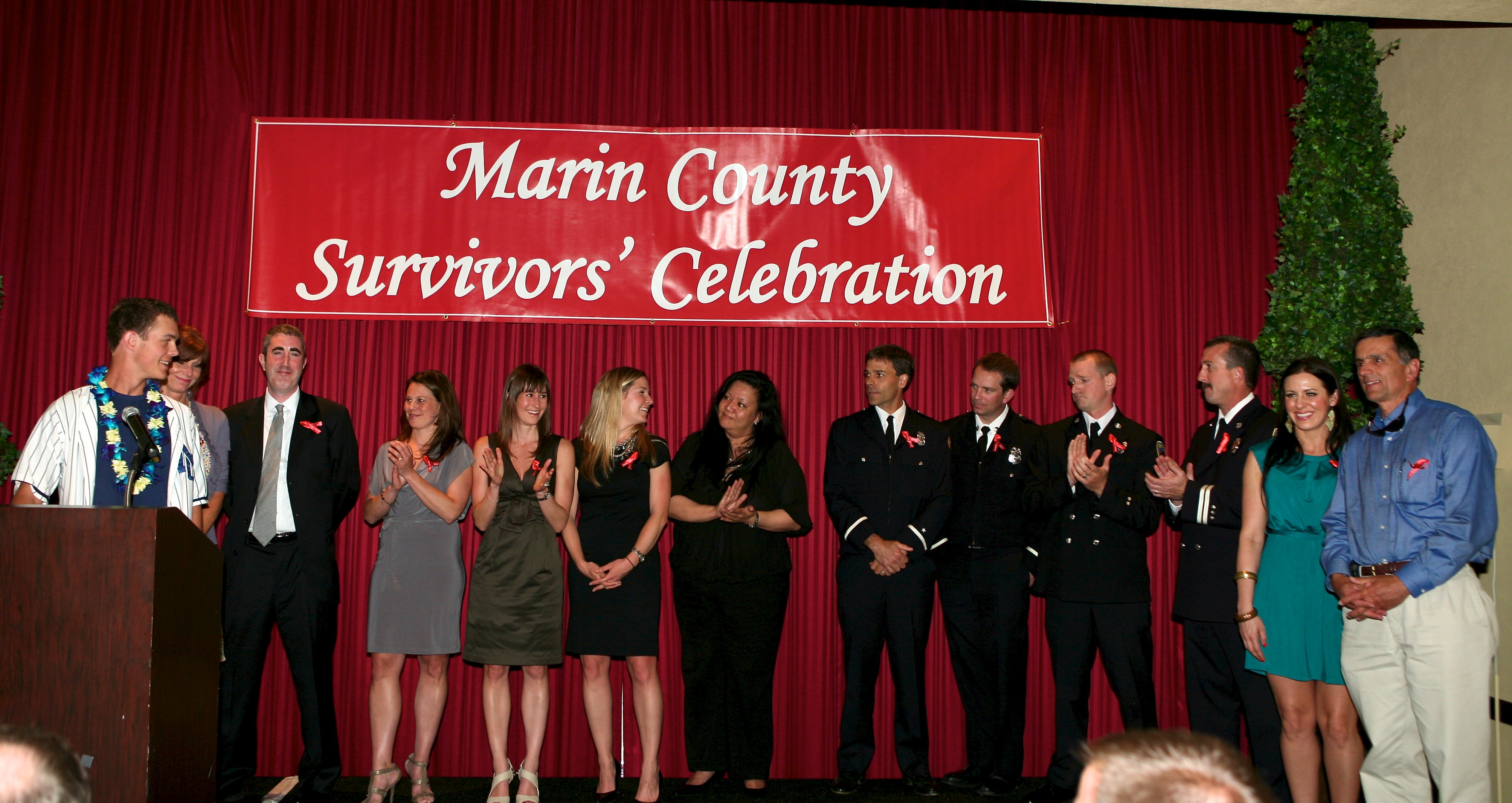 Gunnar Sandberg on stage with rescuers